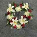 PRE-MADE MEM HEART ARRANGEMENT  CREAM/RED (LILIES)