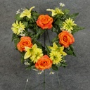 PRE-MADE MEM HEART ARRANGEMENT  ORANGE/YELLOW (LILIES)